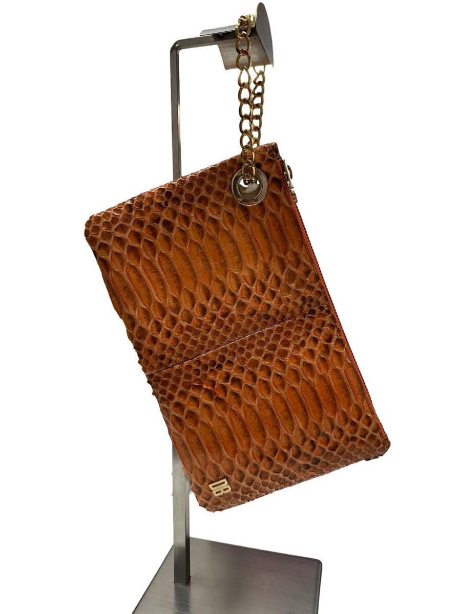 Dirk Bikkembergs (DB) orange Python Print Clutch